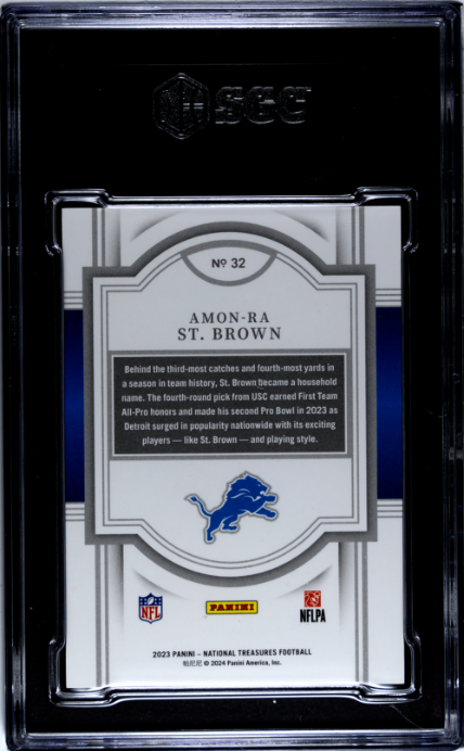 2023 National Treasures #32 Amon-Ra St. Brown Jersey Number Red /14 SGC 10